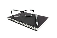 Notebook Glasses And Pen On White Background.