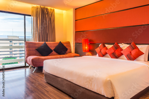 Romantic Master Bedroom With Double Beds And Sofa The