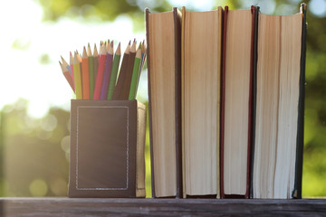 Canvas Print - book stack background table wooden outdoor