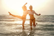 © Dusan Petkovic - Two female friends enjoying in sea.