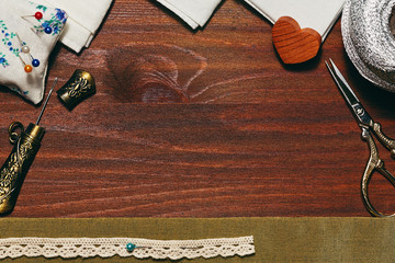 Wooden backdrop with sewing accessories