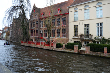 Historic and medieval facade in the old town of Bruges in Belgium.