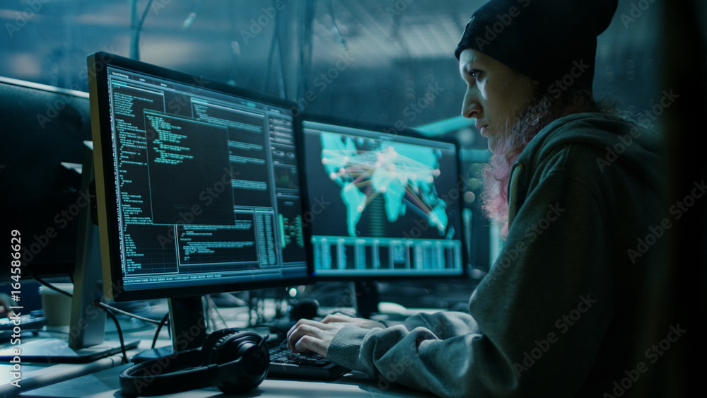 Nonconformist Teenage Hacker Girl Using her Computer to Organize ...