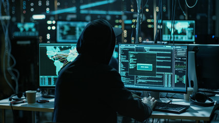 Aufkleber - Teenage Hacker Working with His Computer Infecting Servers and Infrastructure with Malware. His Hideout is Dark and Has Multiple displays.