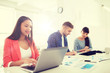© Syda Productions - creative team with tablet pc and papers at office