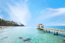 Beautiful Tropical Paradise Beach Landscape, Island With Pier In Turquoise Water