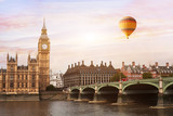 Fototapeta Londyn - hot air balloon in London, beautiful view of Big Ben tower, river  and bridge