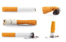 Collage Of Cigarette Butts On White Background