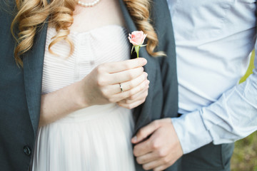 Hands of a loving couple. Wedding ring