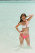 © ViDi Studio - Beautiful girl on the beach on the island