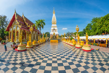That Phanom Buddhist Temple With Worshipers. Geometric Perspective.