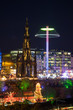 Christmas lights in Edinburgh's Princess Street Gardens with the Sir Walter Scott Monument. Scotland, UK