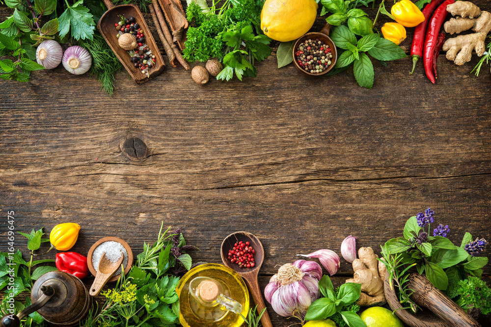 Fresh herbs and spices on wooden table - obrazy, fototapety, plakaty 