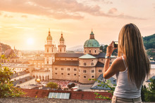 Tourist Taking A Photo Of Beatiful Sunset In Salzburg Austria