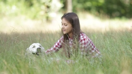 Poster - Girl and retriever on green grass