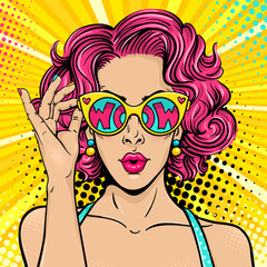 wow pop art face. sexy surprised woman with pink curly hair and open mouth holding sunglasses in her