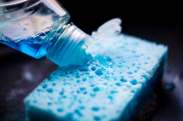 Blue Dishwashing Sponge with Black Background