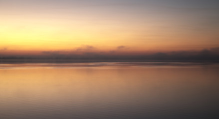  Sunrise with fog over lake