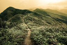 Storybook Landscape Of A Footpath Through Rolling Hills On The Caoling Historic Trail In Taiwan