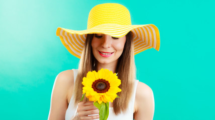 portrait attractive woman with sunflower