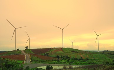 Wind turbine farm during beautiful sunset, Alternative green energy for protection of nature at  Khao Kho, Phetchabun province, Thailand