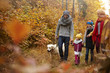 © gpointstudio - Happy family sightseeing colorful woodland