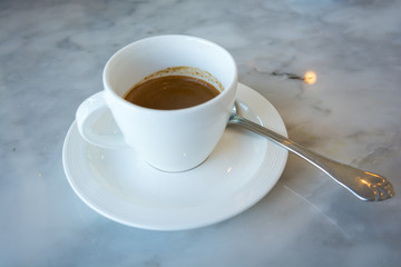 Espresso coffee cup on marble table