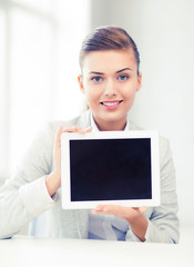 Poster - businesswoman with tablet pc in office