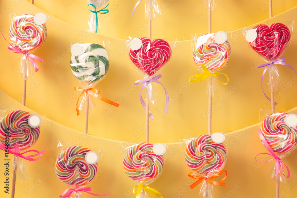 Different lollipops on showcase at candy shop