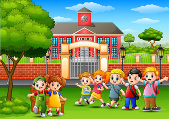 Poster - Happy school children standing in front of school building