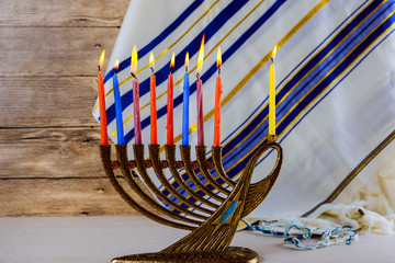 Canvas Print - Jewish holiday Hanukkah creative background with menorah. View from above focus on .