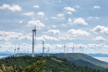 Canvas Print - wind farm against a sunny sky