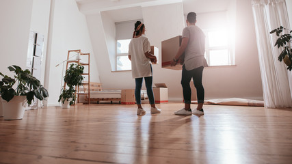 young couple moving in new house