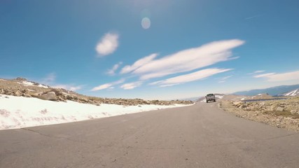 Fototapete - POV point of view -  Driving on alpine road of Mount Evans in Early Summer