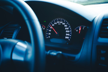 Driving car speedometer speed transportation background.