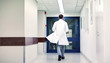 © Syda Productions - medic or doctor walking along hospital corridor