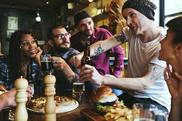 Canvas Print - A group of friends at a party talking