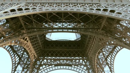 paris, france: eiffel tower - la tour eiffel - famous paris architectural object - slow pan, low ang