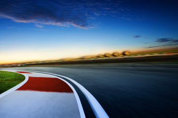 Wall Mural - Motion blurred racetrack ,cold mood , early morning scene .