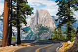 Fototapeta Góry - The road leading to Glacier Point in Yosemite National Park, California, USA with the Half Dome in the background.