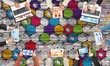 © adam121 - Top view of businesspeople sitting at table and using gadgets