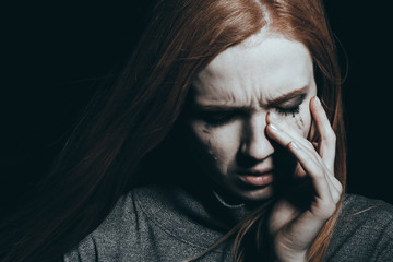 Wall Mural - Troubled teenager crying