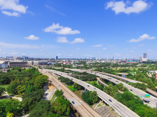 Aerial View West-central Area In Houston From Downtown. Allen Parkway,  Memorial Dr, Gulf Freeway, Interstate I-45, Bayou River. Mid-town High-rise, Residential Building, Business District In Distance