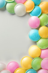 Sticker - Frame made of tasty colorful candies on white background