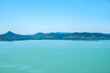 sailboat on water, volcanic hills in background - summertime and vacation at Balaton lake