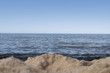 Sea landscape with beach. Sand on the beach. Blue sky. Nature landscape. Baltic Sea