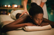 © Lumina/Stocksy - Woman receiving a back massage at spa