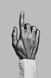 © BONNINSTUDIO/Stocksy - Businessman hand pointing. Black and white