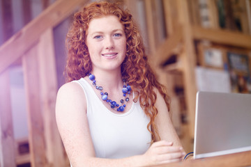 Wall Mural - Young woman in office