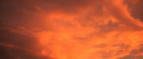 Fototapeta Zachód słońca - Red clouds at sunset.